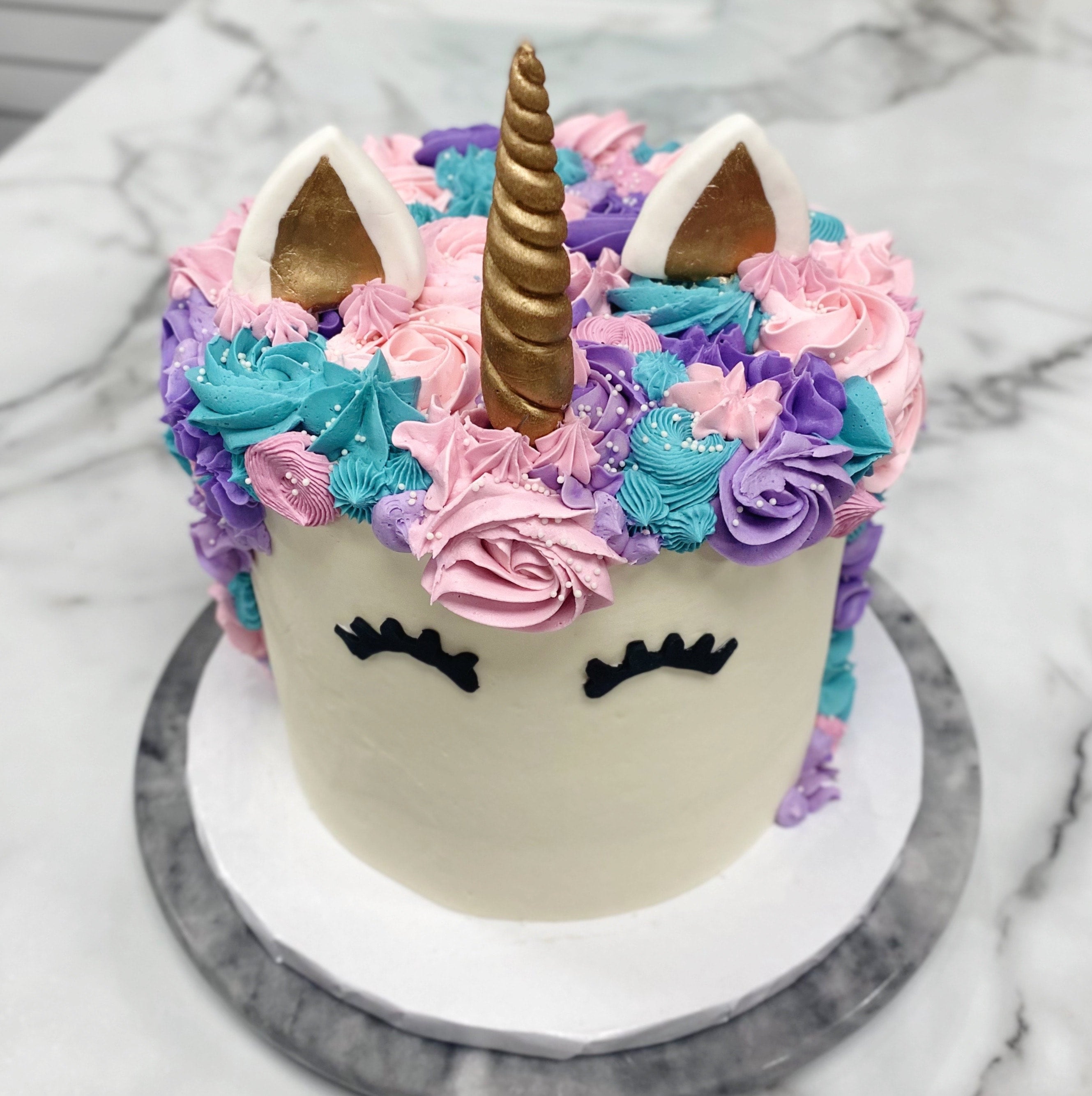 Lil baby 4” unicorn cake 💜🦄 : r/Baking